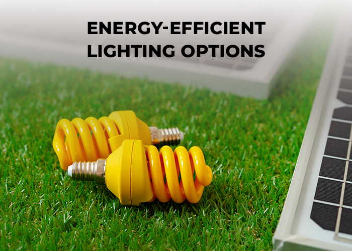 two orange energy savers bulbs are placed on green artificial grass, symbolizing energy consumption techniques